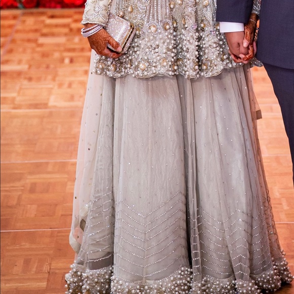 Ivory colour Bridal peplum with lehnga. And pearl worked dupatta. - Picture 1 of 3